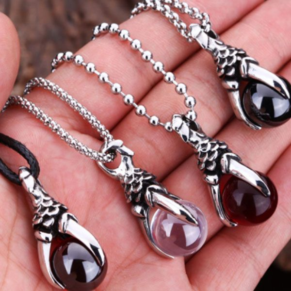 Dragon claw store necklace meaning