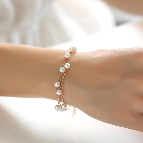 pearl bracelet Triple Strand Pearl Bracelet - ApolloBox
