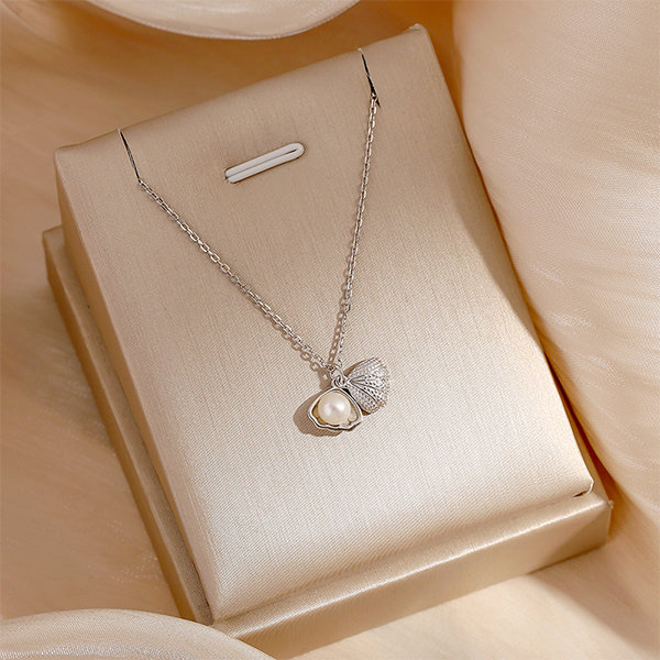 Sterling Silver Shell Pearl Necklace from Apollo Box