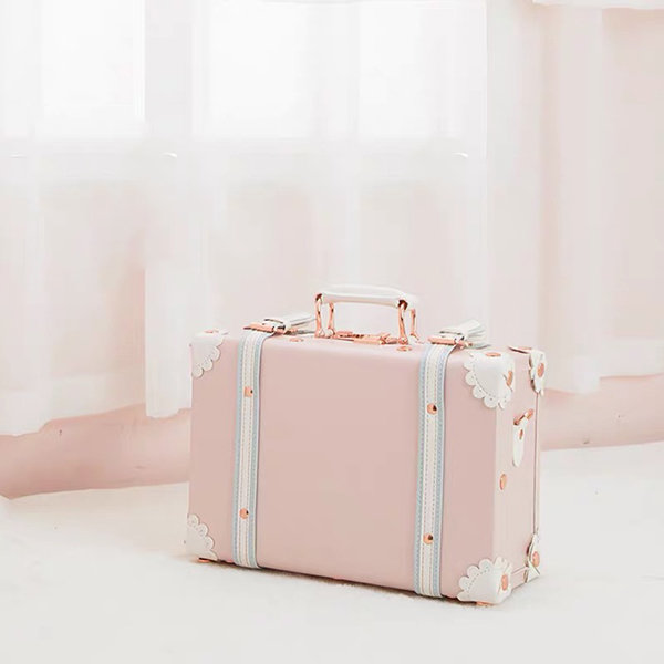 pink and white suitcase