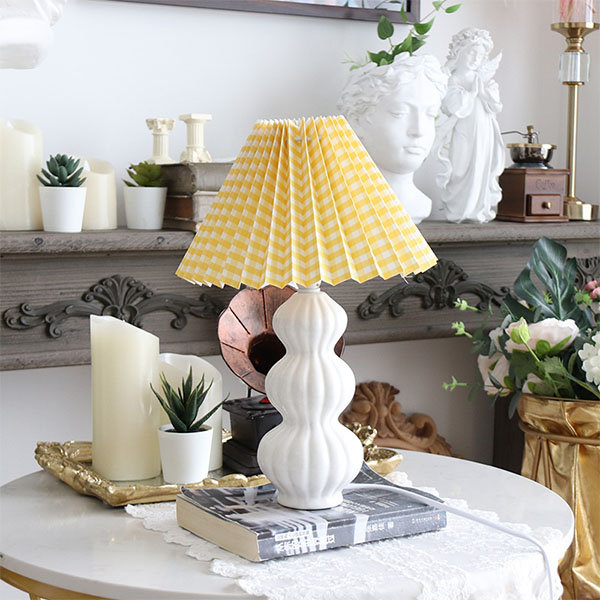 yellow and white table lamp