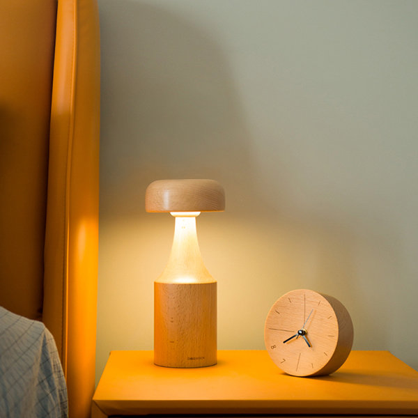 This wooden lamp adds a touch of retro minimalism to illuminate
